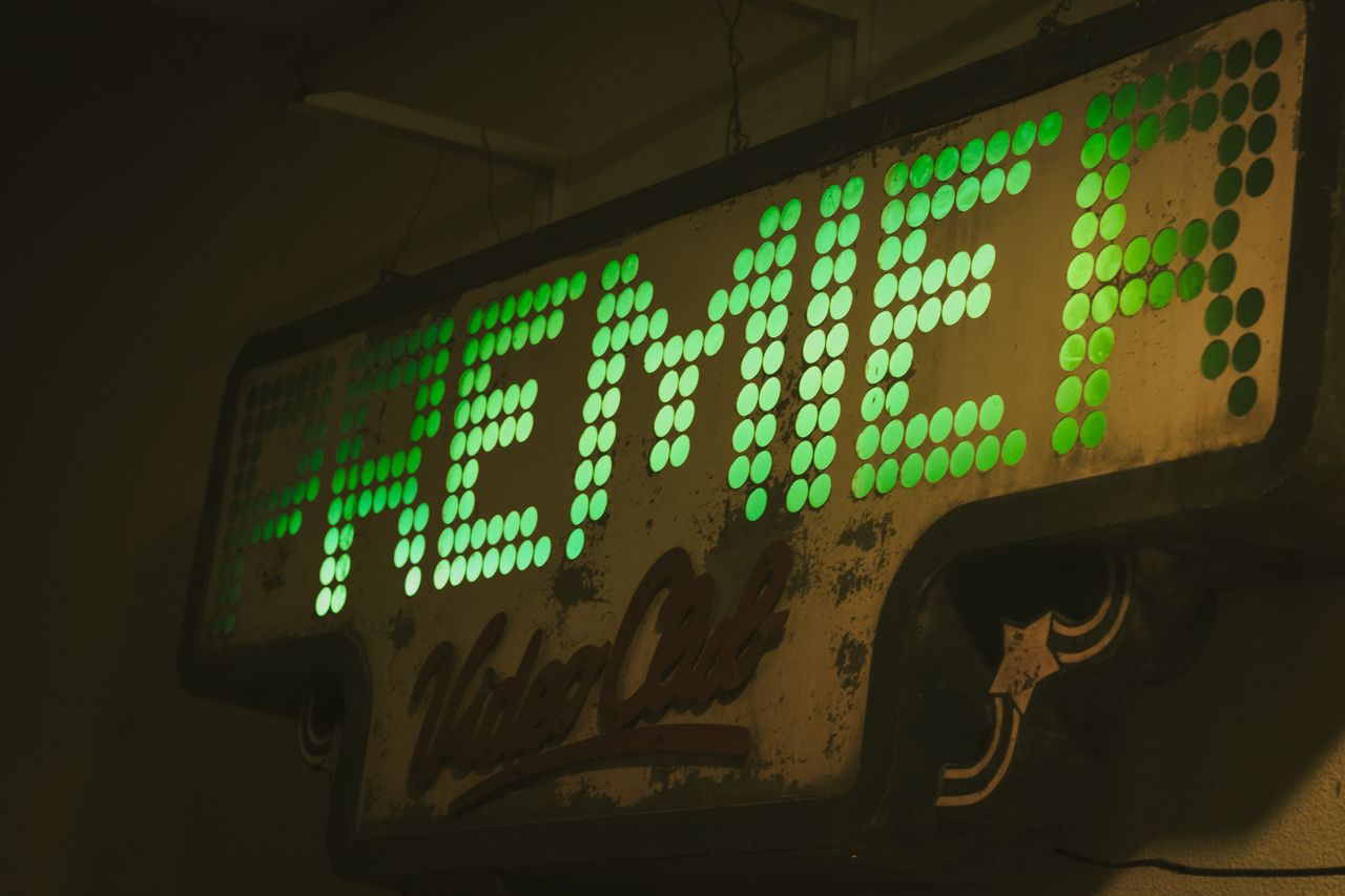 gallery-5 Retro Premier Video Club sign with green LED lights in Rosario, Argentina.
